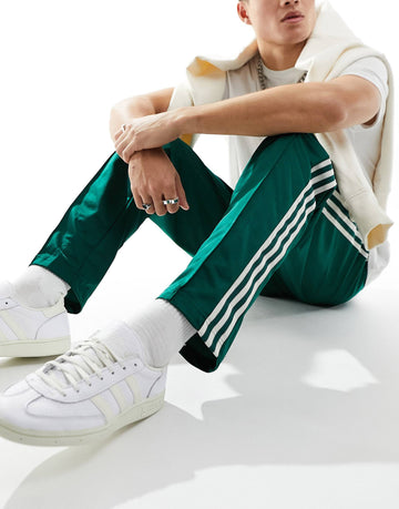 adidas Originals track pants green off white
