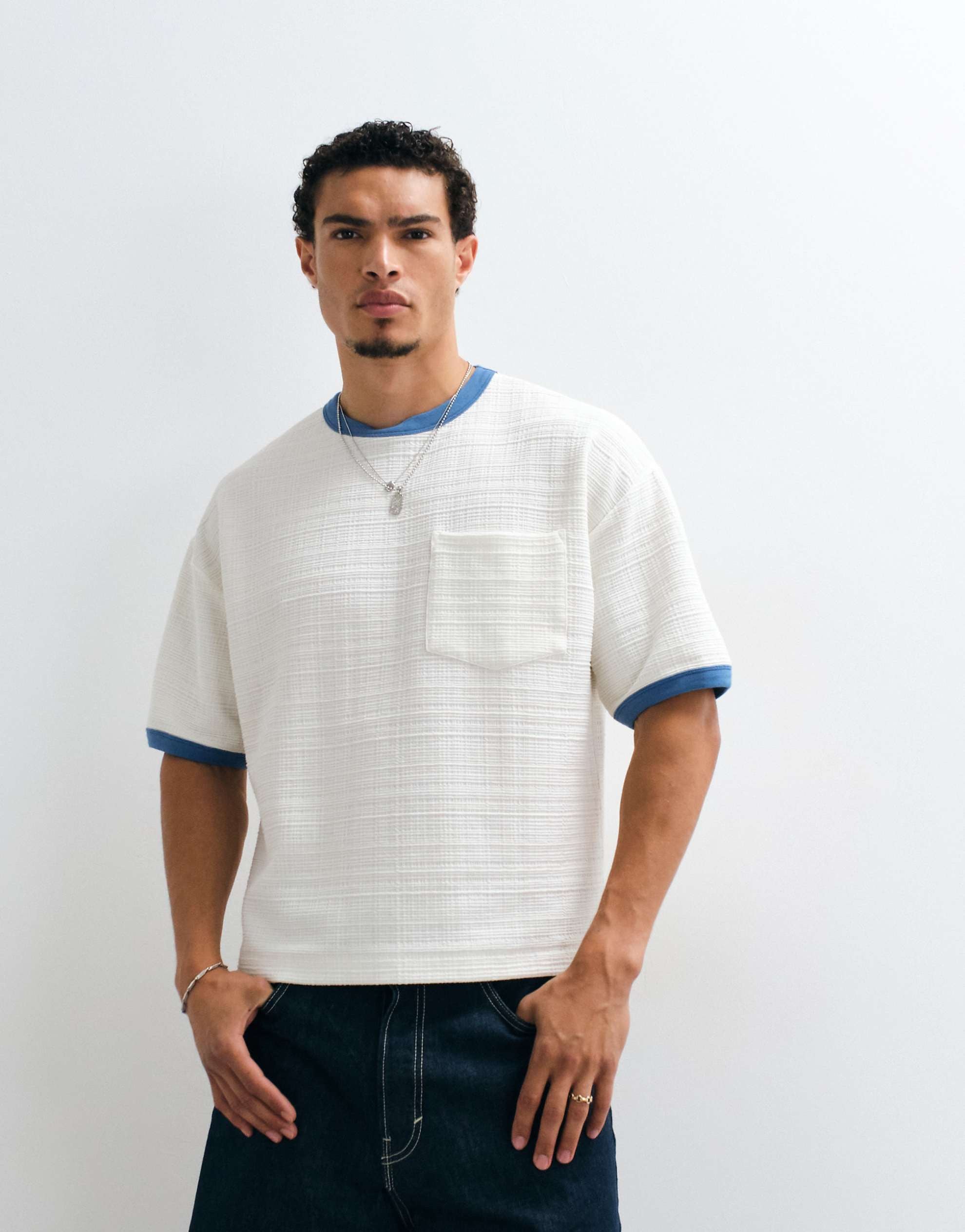 DESIGN boxy oversized t-shirt pocket cream texture.