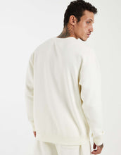 Load image into Gallery viewer, New Balance reimagined graphic fleece sweatshirt off white