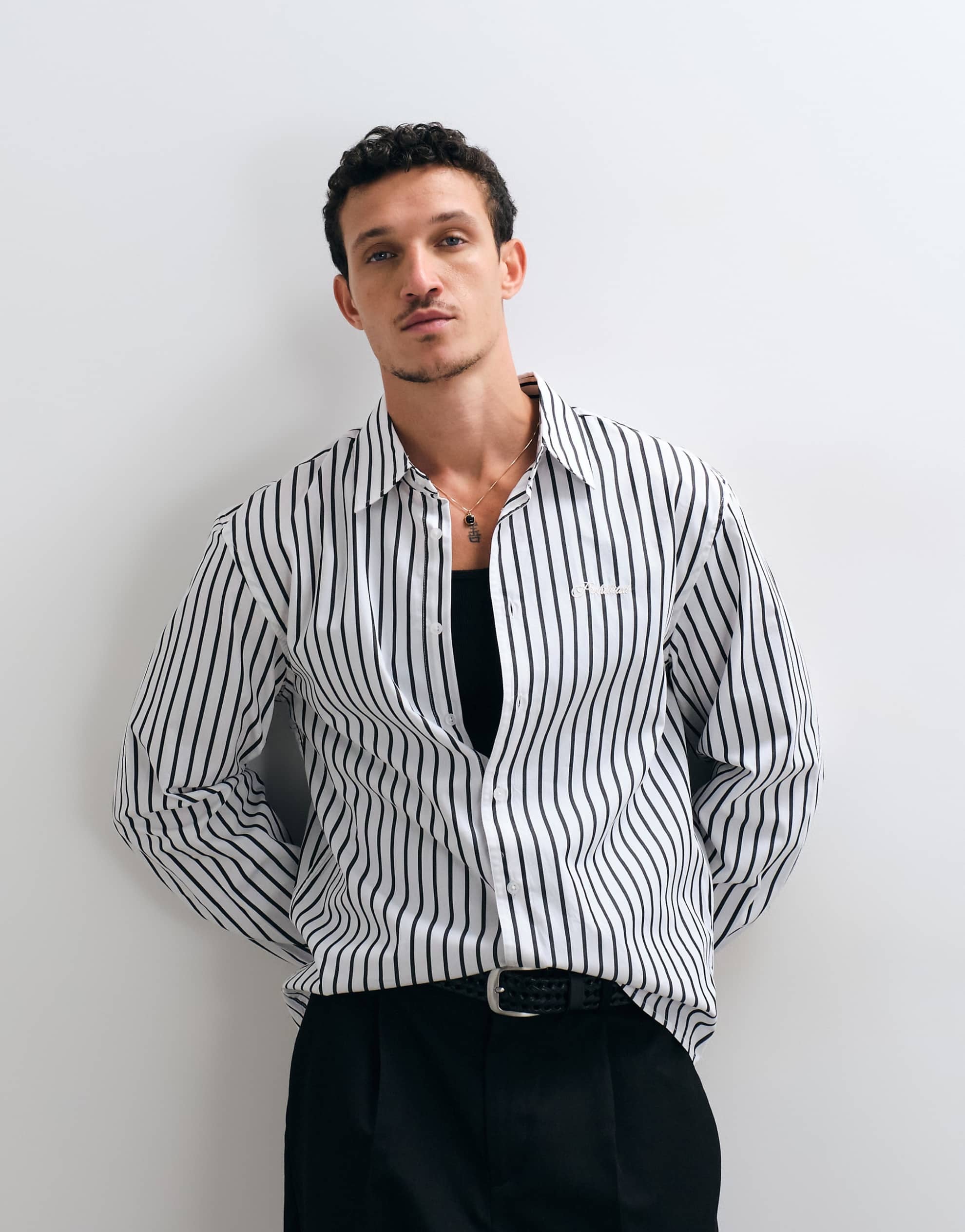 Prohibited script pocket long sleeve shirt white black stripe