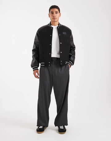 Tommy Jeans flag logo varsity jacket leather sleeve black