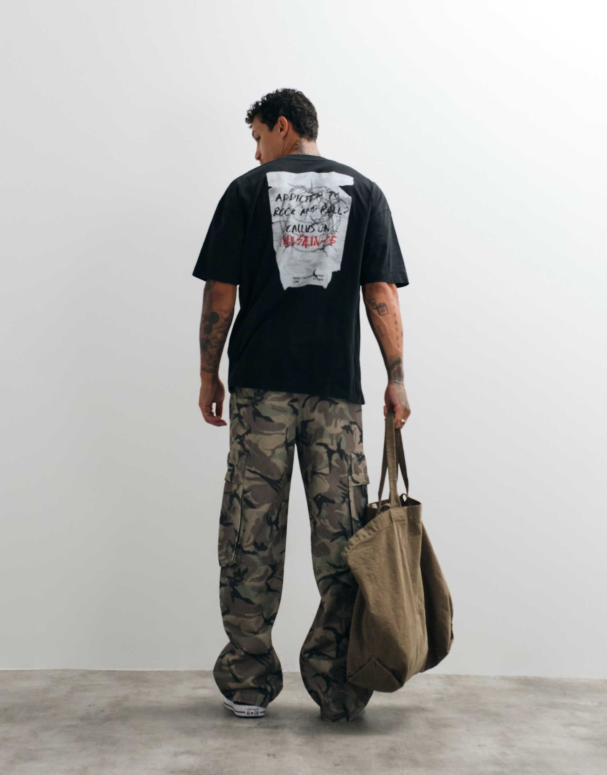 AllSaints Caller short sleeve graphic logo t-shirt back print washed black.