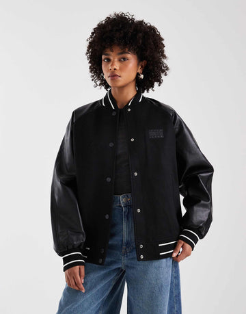 Tommy Jeans oversized flag logo varsity jacket black