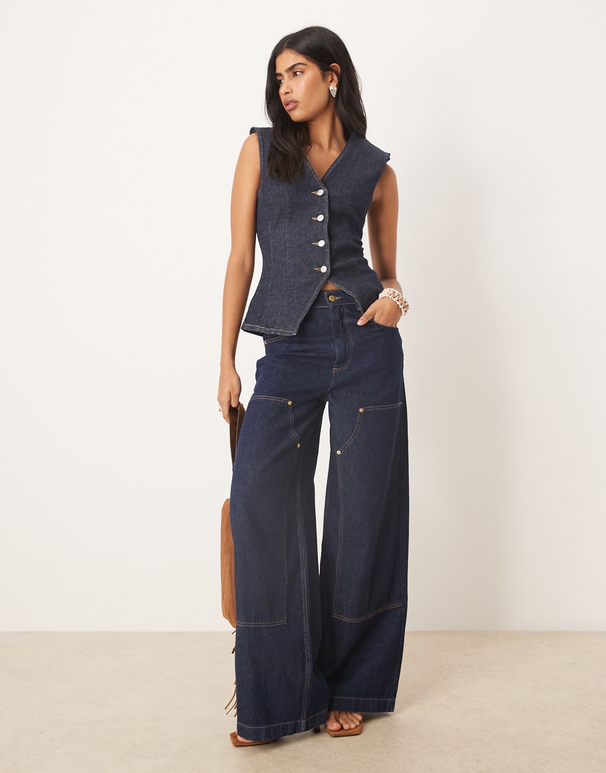 DESIGN cinched waist denim waistcoat