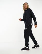 Load image into Gallery viewer, Under Armour co-ord Summit blend joggers black