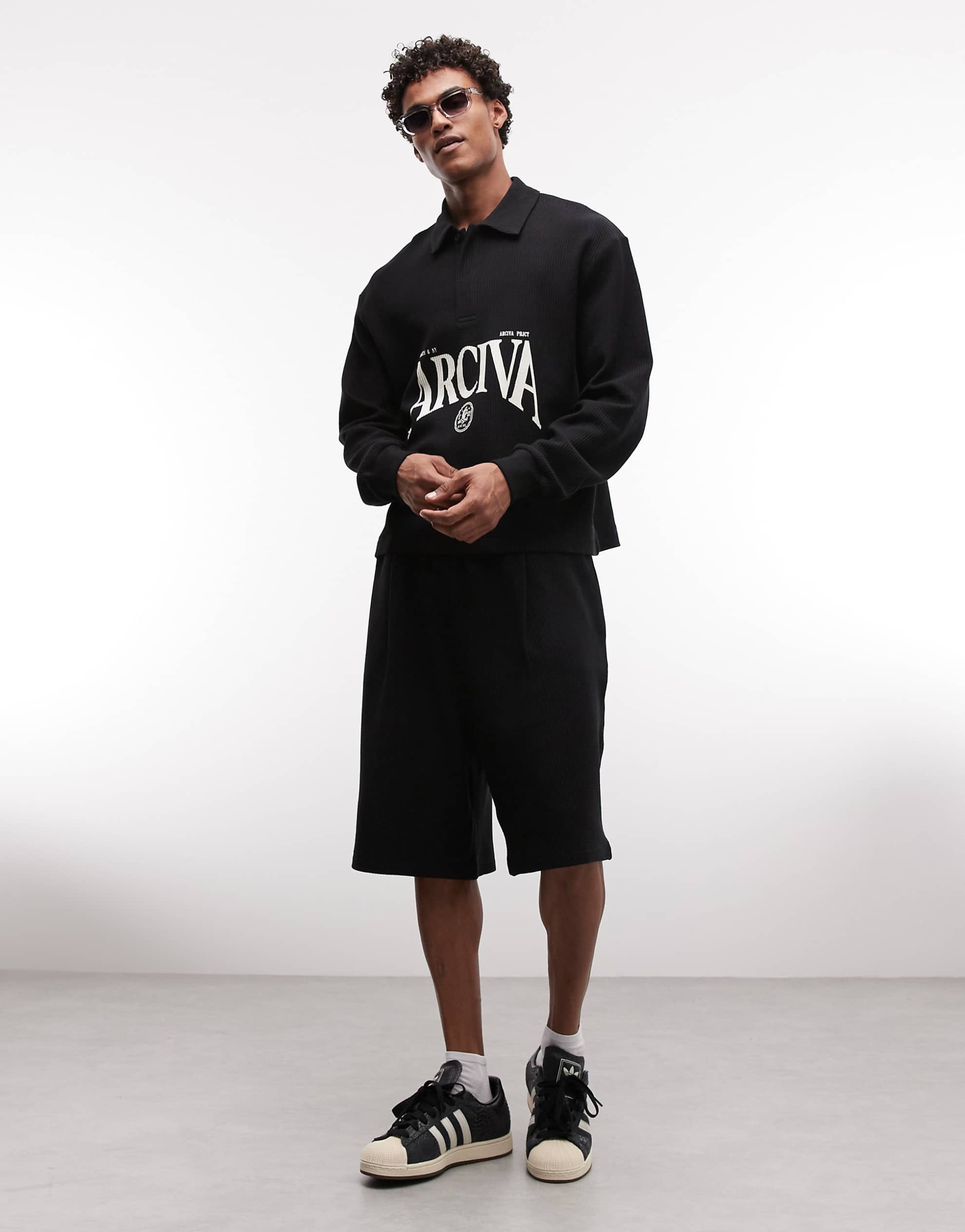 DESIGN relaxed boxy ottoman textured polo text graphic black