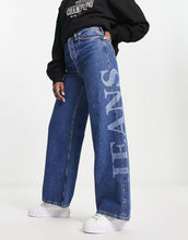 Load image into Gallery viewer, Tommy Jeans high rise wide leg jeans mid wash
