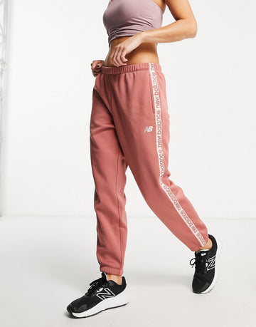 New Balance Running Relentless joggers dusky pink