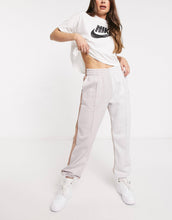 Load image into Gallery viewer, Nike Metallic Swoosh colour block joggers neutrals