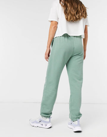 Nike mini metallic swoosh oversized green joggers