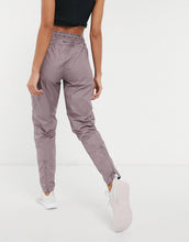 Load image into Gallery viewer, Nike Running Run Division track pants purple