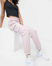 Load image into Gallery viewer, Nike Swoosh fleece joggers light pink