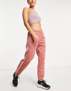 New Balance Running Relentless joggers dusky pink