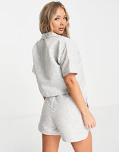 Load image into Gallery viewer, Puma crop shirt blue floral print