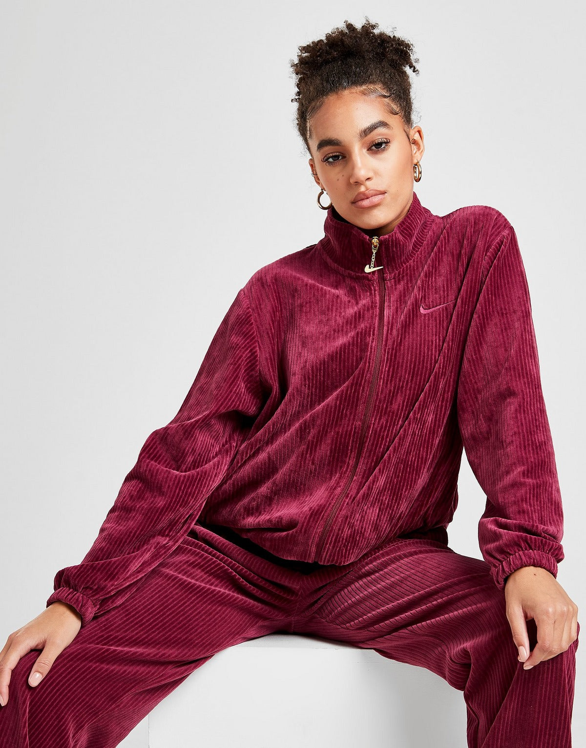 Nike velour best sale track top